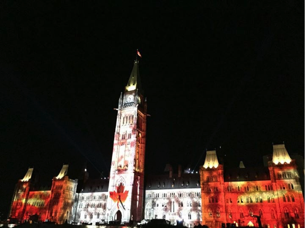 Kids enjoy the light show at Canada’s Parliament Buildings while they study English in Canada